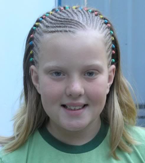 Picture of blonde cornrow hair. 