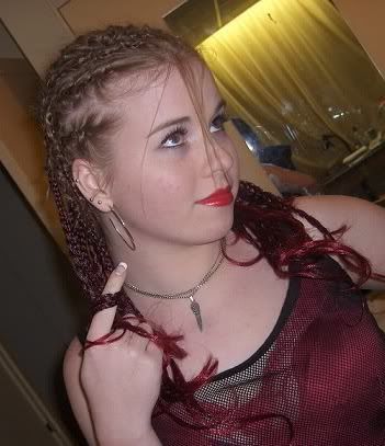 Picture of red cornrows hair. 