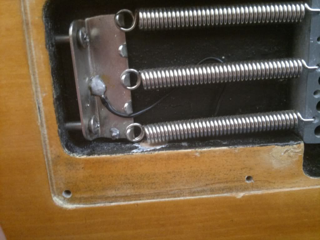 How to fix rattling sound from bridge? Electric Guitars Harmony Central