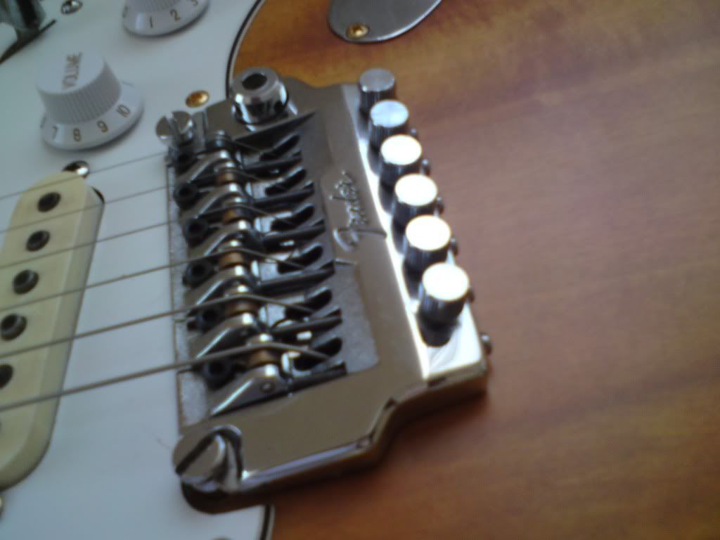 How to fix rattling sound from bridge? Electric Guitars Harmony Central