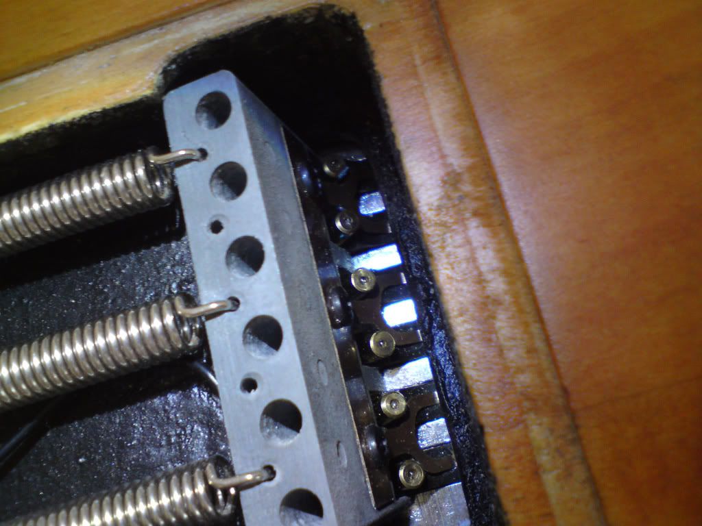 How to fix rattling sound from bridge? Electric Guitars Harmony Central