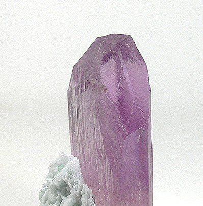 Today's crystal:~Kunzite~Kunzite is an important healing companion as it encourages us to relax and take each step at a time, to come into the moment and accept life for what it is, not what we think it should be.Sometimes in life we need... action and determination to make things happen and sometimes we need to let go and let the universe handle the details. Kunzite comes into its own under these circumstances. Its soft and powerful light remind us on a deep level to trust our inner process, that all is well and will unfold for our deepest good.Kunzite activates in us a deep appreciation of life, reminding us that the universe is a benevolent and loving force that seeks the best for us, if we allow